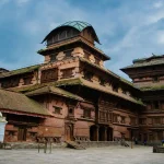 The historic wooden architecture of the traditional Nine-Story Palace (Nautalle Durbar) courtyard in Kathmandu, Nepal