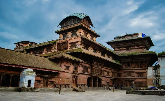 The historic wooden architecture of the traditional Nine-Story Palace (Nautalle Durbar) courtyard in Kathmandu, Nepal